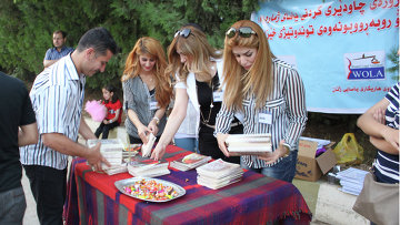 نساء كرديات يوزعن منشورات توعوية بمخاطر الحالة
